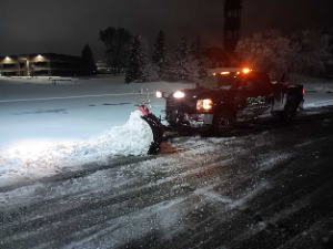 Sanding and salting services for a commercial entrance.